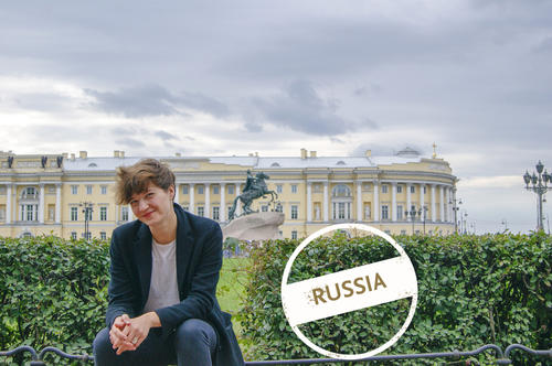Lilia Becker in front of the Senate Square in Saint Petersburg with the equestrian statue of Tsar Peter the Great in the background.
